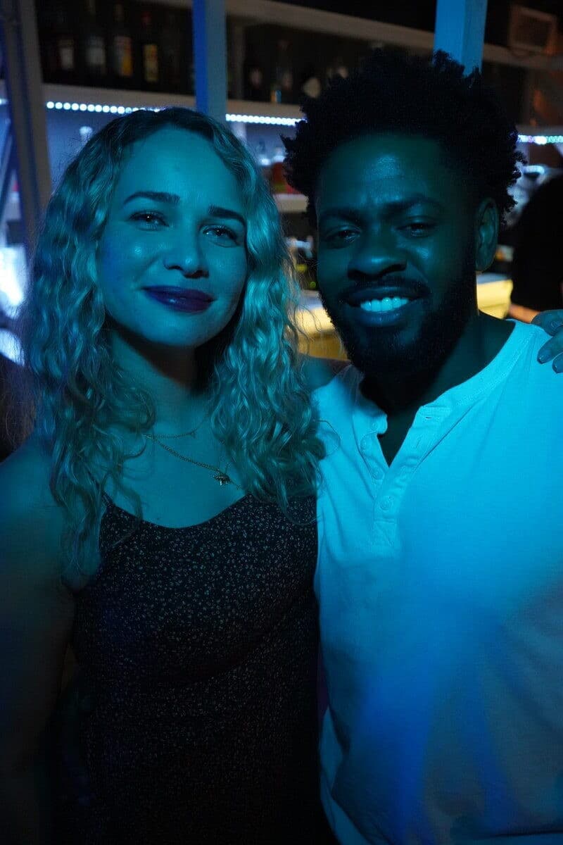 Couple vibing in blue light